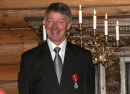 Atle Liland med Kongens fortjenstmedalje
